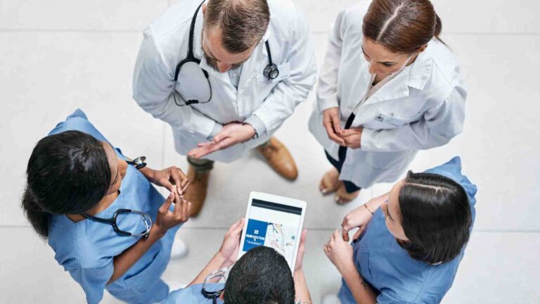 Medical team collaborating at Allina Health Eagan Clinic to provide patient-centered healthcare in Eagan, Minnesota.
