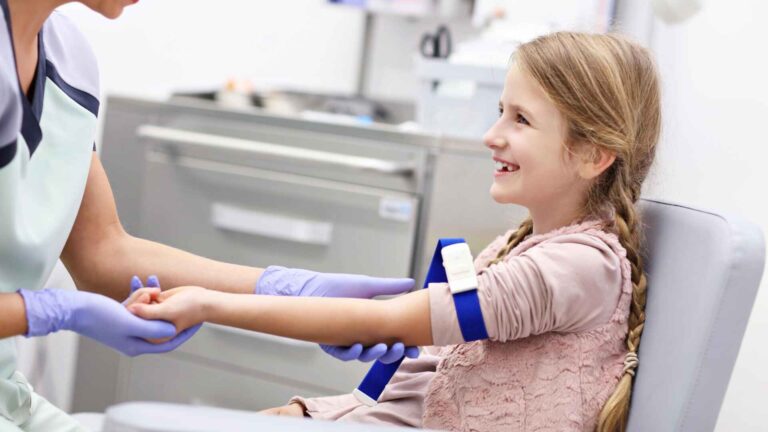 Child receiving medical care symbolizing the NBC vaccine divide coverage on vaccinations.