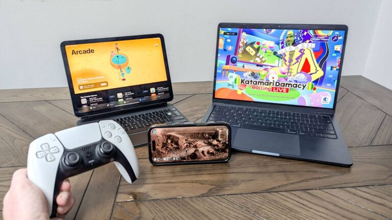 How Custom Ps5 Controllers Can Level Up Your Gaming Setup Person holding a custom PS5 controller in front of laptops and a smartphone displaying gaming screens.