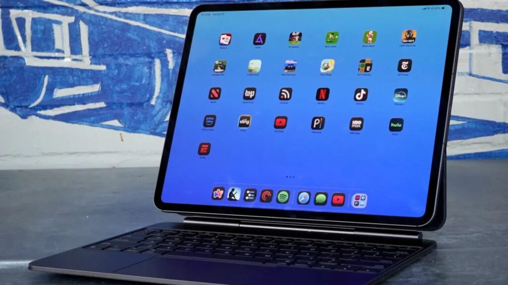 iPad Pro 2025 displayed on Magic Keyboard showing app icons trending on Google Trends