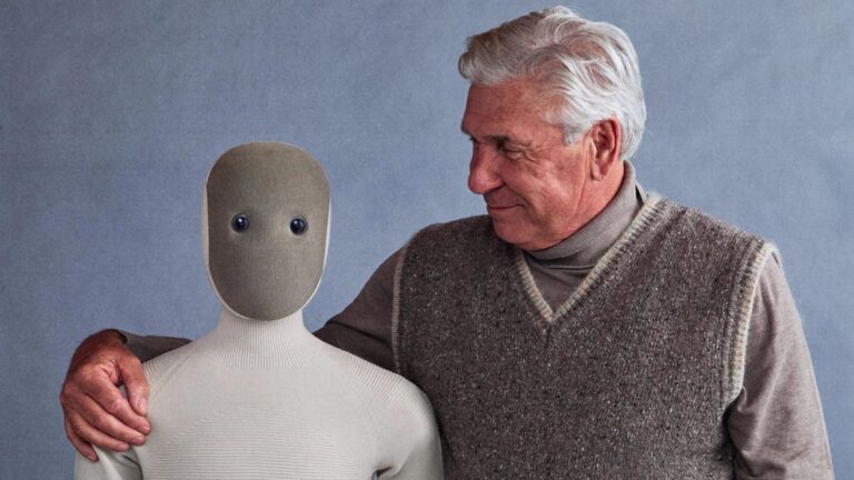Neo humanoid robot interacting with elderly man showing emotional connection and humanlike design by 1X Technologies.