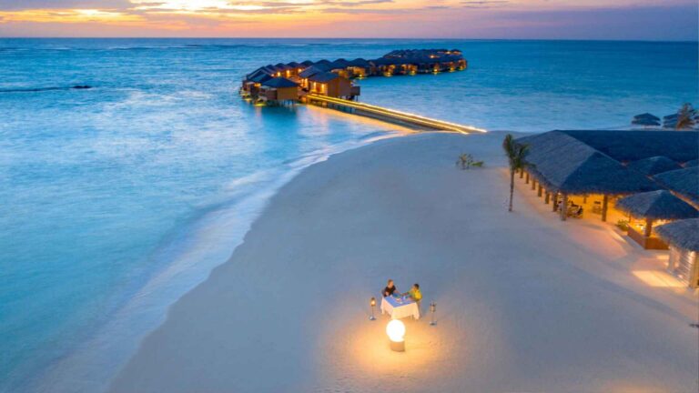 Luxury beach resort sunset view for Belize travel packages