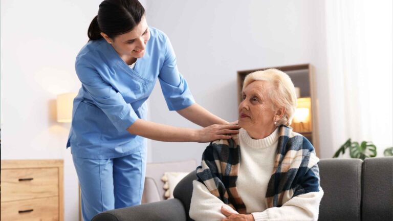 Nurse providing care to elderly woman at Banner Health Maricopa facility