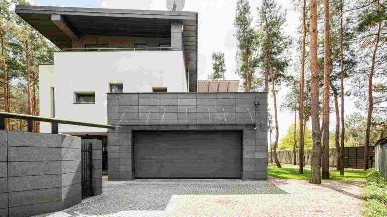 Modern luxury villa with secure gate representing Gate 1 Travel special deals