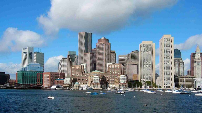 Skyline view of Boston city with waterfront buildings near Atrius Health Boston Kenmore.