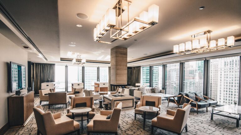 Insider Guide To The Best Bages Hotel Luxury Meets Budget Luxurious modern lounge area in a high-rise bages hotel overlooking the city skyline